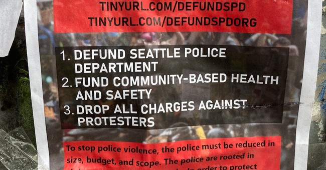 Seattle to Cut Police Department Budget as City Council Overrides Mayor’s Veto