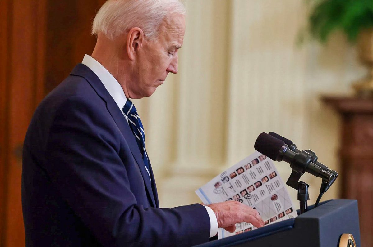 President Biden leaned on detailed notes, photos of journalists at first formal news conference