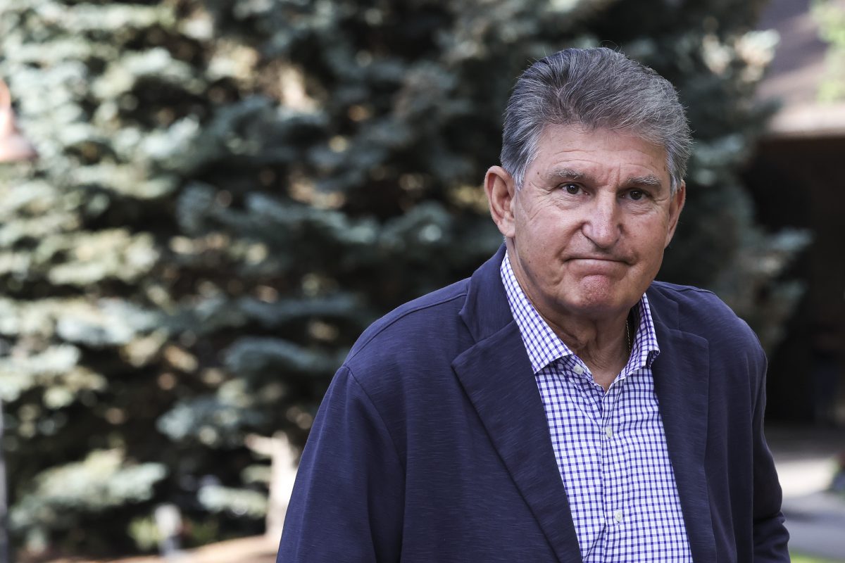 Manchin was moments away from abandoning Biden on huge stage